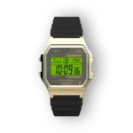 Arany színű, digitális Timex T80 óra fekete szilikon szíjjal, világos zöld kijelzővel és funkciók kijelzésével.