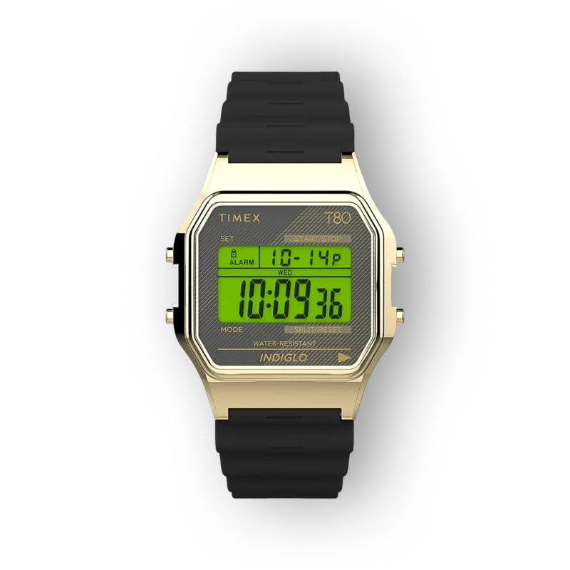 Arany színű, digitális Timex T80 óra fekete szilikon szíjjal, világos zöld kijelzővel és funkciók kijelzésével.