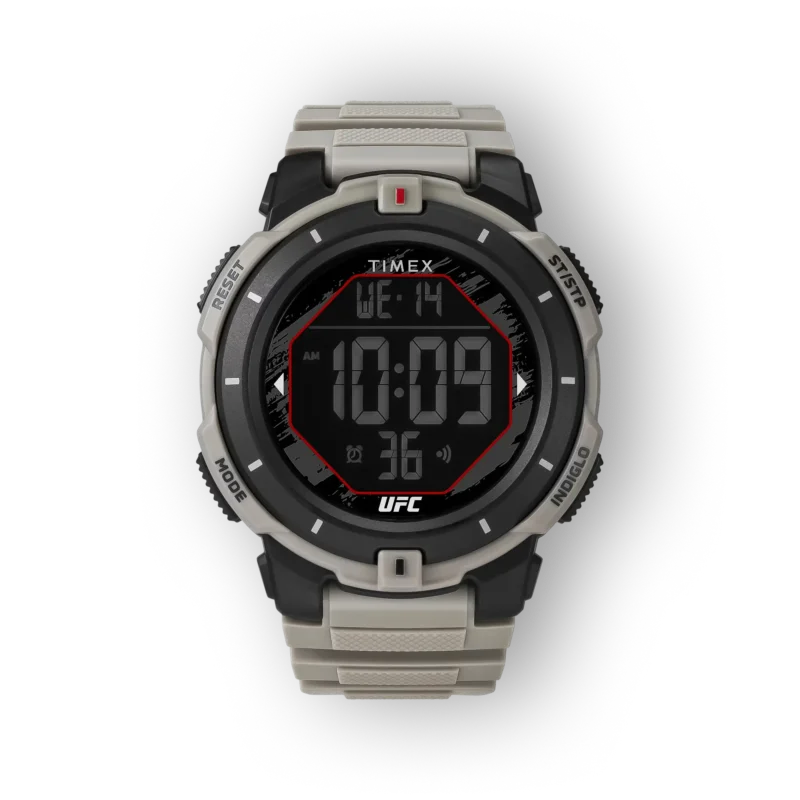 Digitális Timex óra, fekete háttérrel, szürke és fekete házzal, nagy számokkal: 10:09, piros kerettel, UFC logóval.