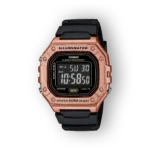 Réz színű Casio digitális óra fekete szíjjal, világos számjelenítéssel, vízállóság 50 méterig, háttér fekete.