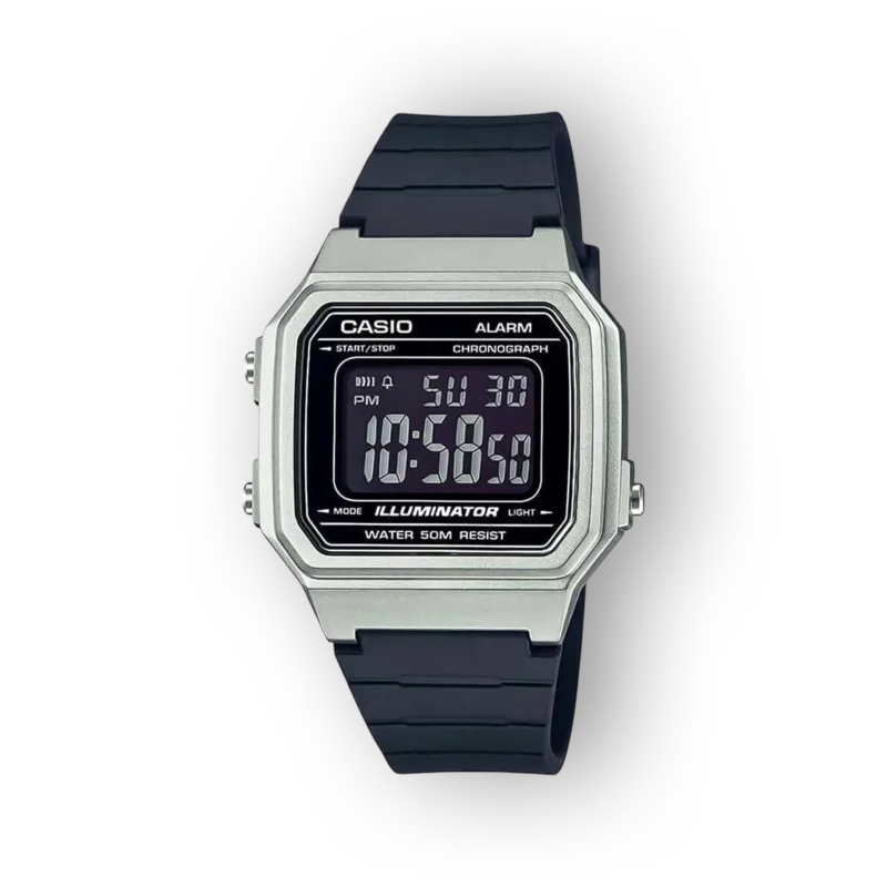 Fekete háttéren látható a Casio digitális karóra, ezüst színű tokban, fekete szilikon szíjjal, digitális kijelzővel és világítással.