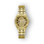 Arany színű Guess óra, áttetsző számlappal és strasszkövekkel díszített fém szíjjal.