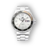 Silver Orient Kamasu watch with a white dial, black and silver bezel, displaying date and day features, on a metal bracelet.