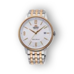 Silver and gold-tone Orient automatic watch featuring a white dial, gold markers, and a date display, set against a black background.